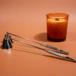 Candle wick snuffer