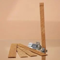 Perforated wooden wicks for candles