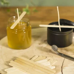 Wooden wick centerer